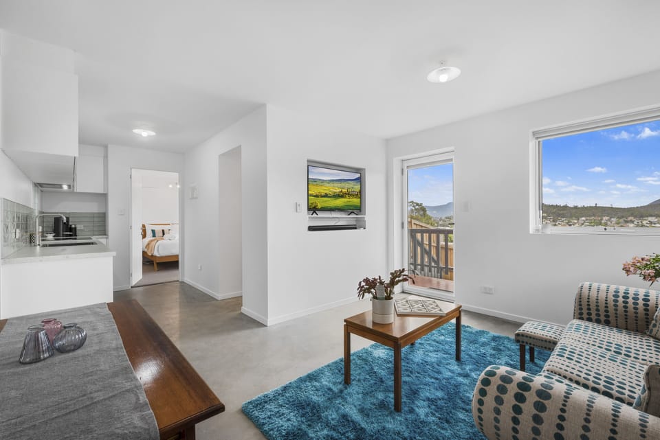 Standard Apartment | Living area | 50-inch Smart TV with digital channels, TV