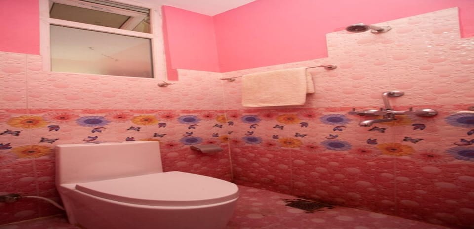 Shower, rainfall showerhead, towels, soap