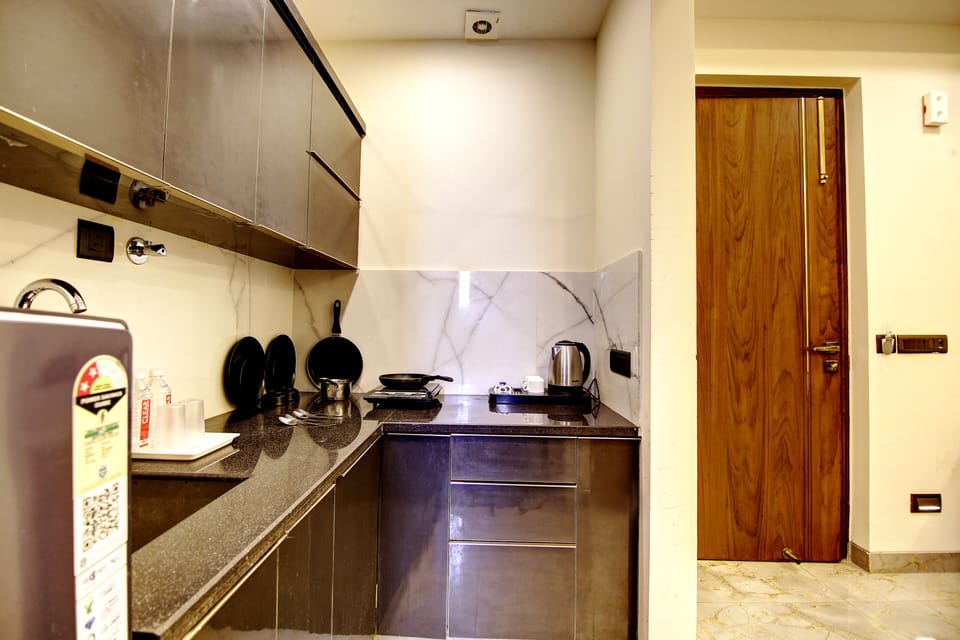 Deluxe Room | Private kitchenette | Electric kettle