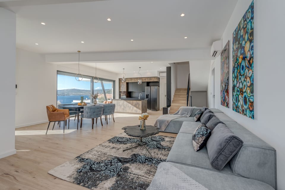 Villa | Living area | 120-cm Smart TV with cable channels, DVD player