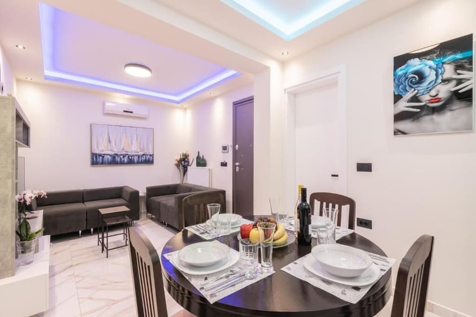 Basic Apartment | Living area | 40-inch Smart TV with satellite channels