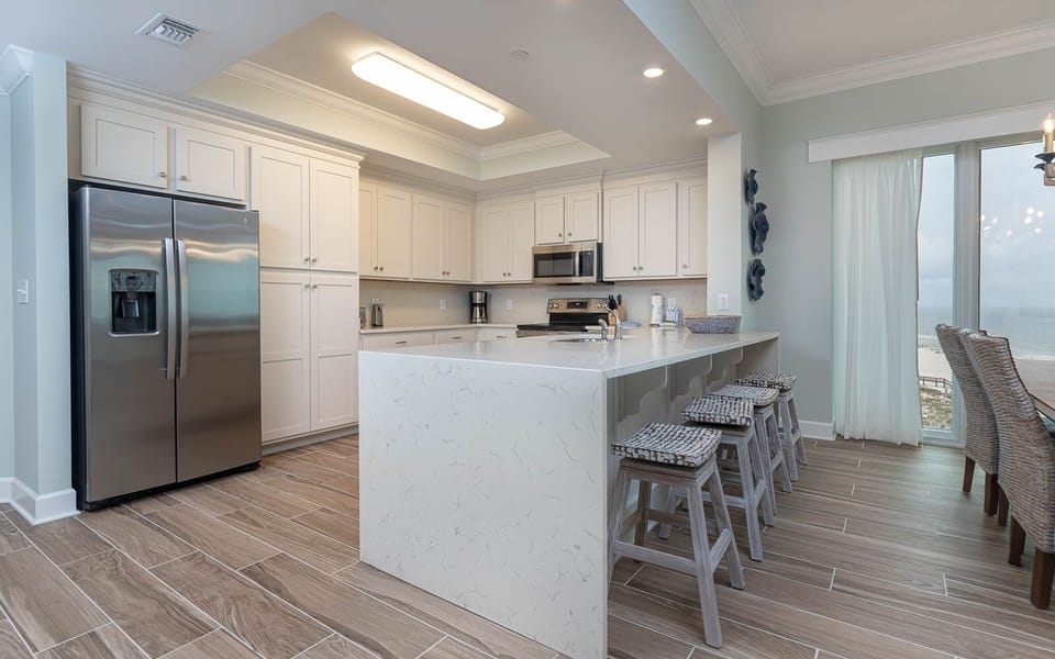 Condo, 4 Bedrooms | Private kitchen | Coffee/tea maker, fridge, oven