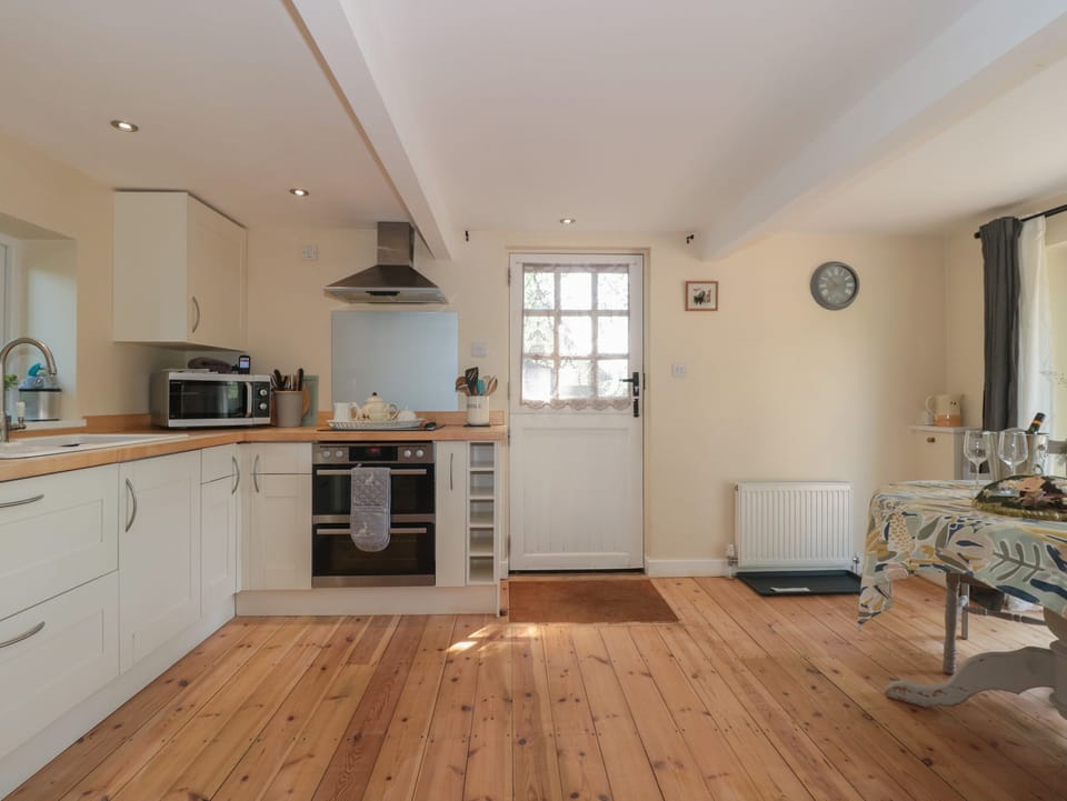 Fridge, electric kettle, toaster, cookware/dishes/utensils