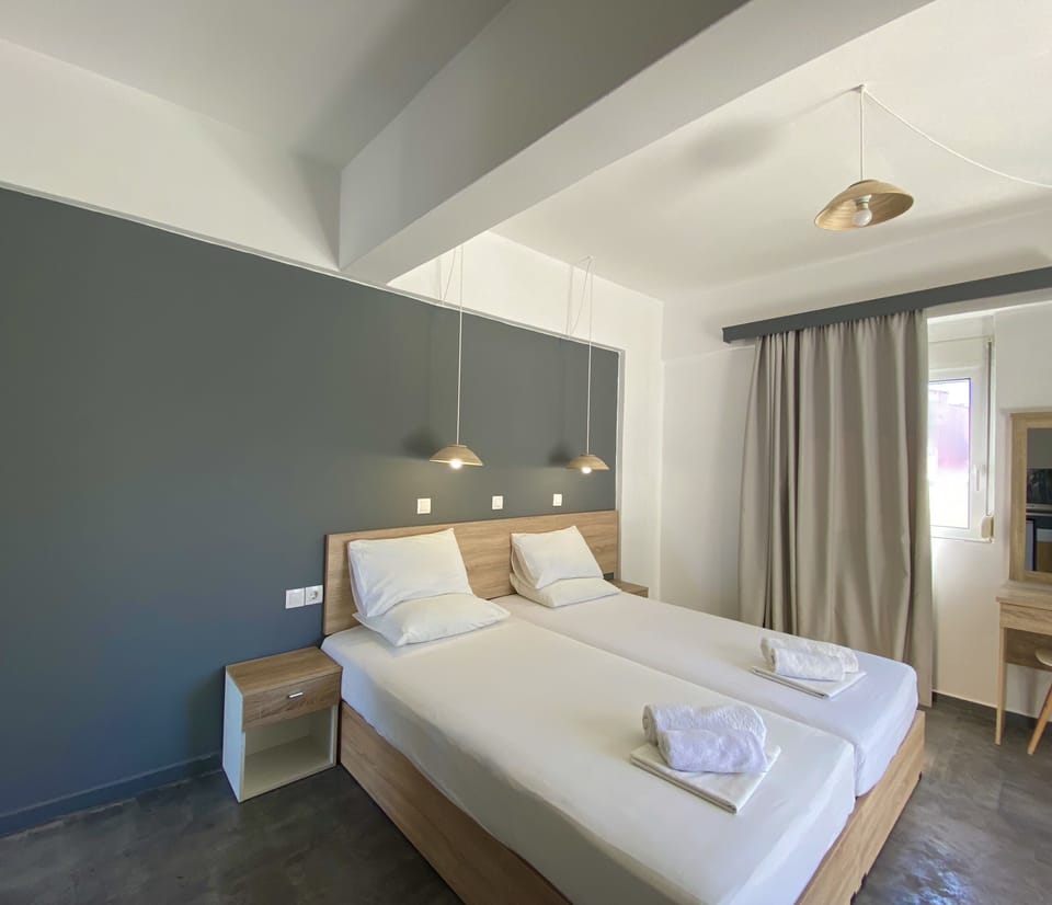 Double Twin Room | 1 bedroom, in-room safe, laptop workspace, blackout drapes