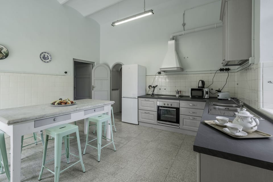 Villa | Private kitchen | Full-size fridge, microwave, oven, stovetop