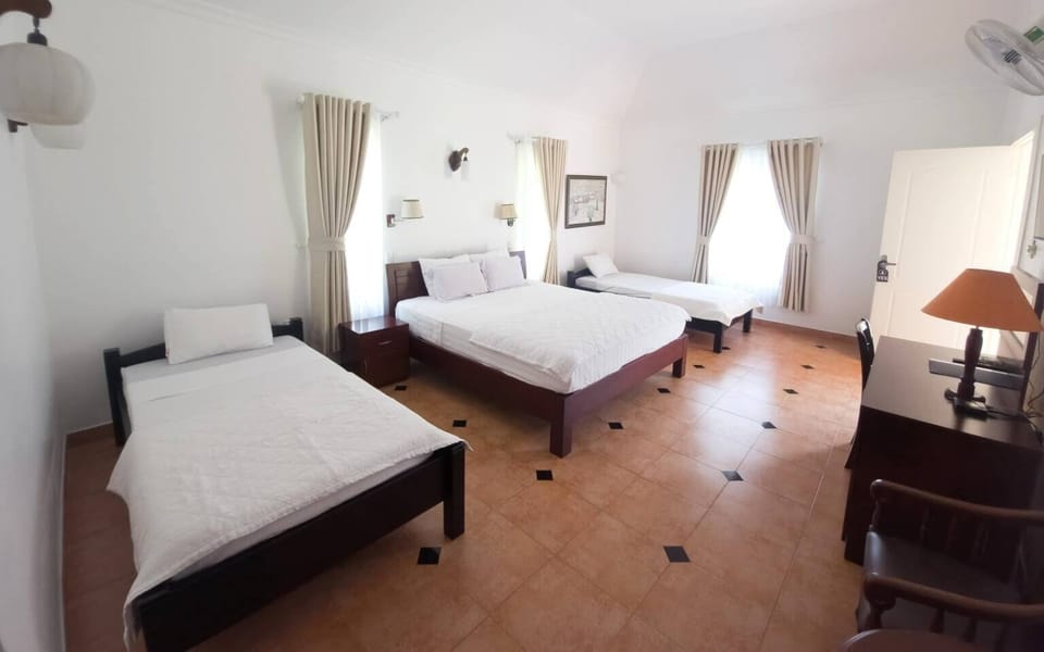 Family Room, 3 Bedrooms | Minibar, in-room safe, desk, blackout drapes