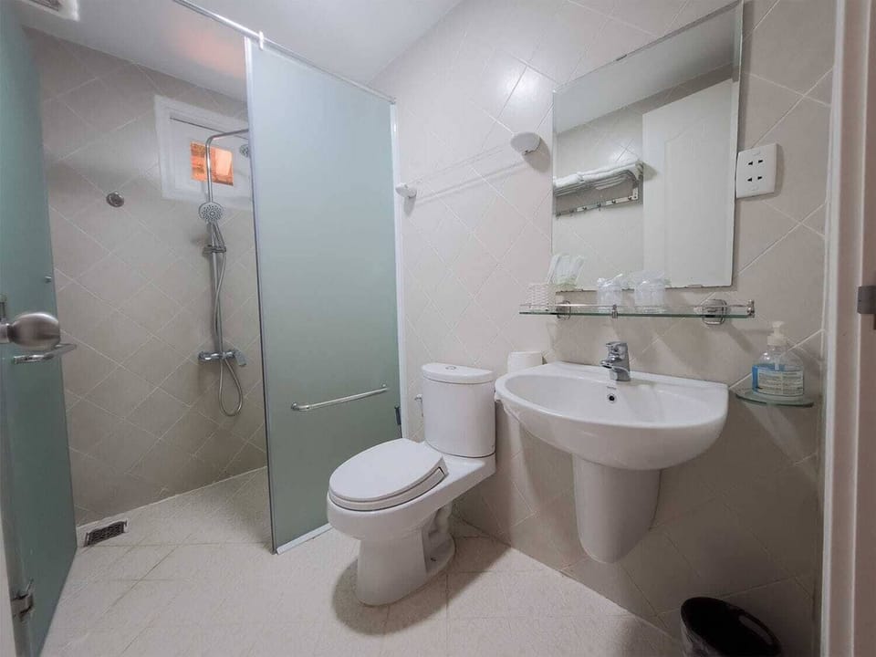 Shower, free toiletries, hair dryer, slippers