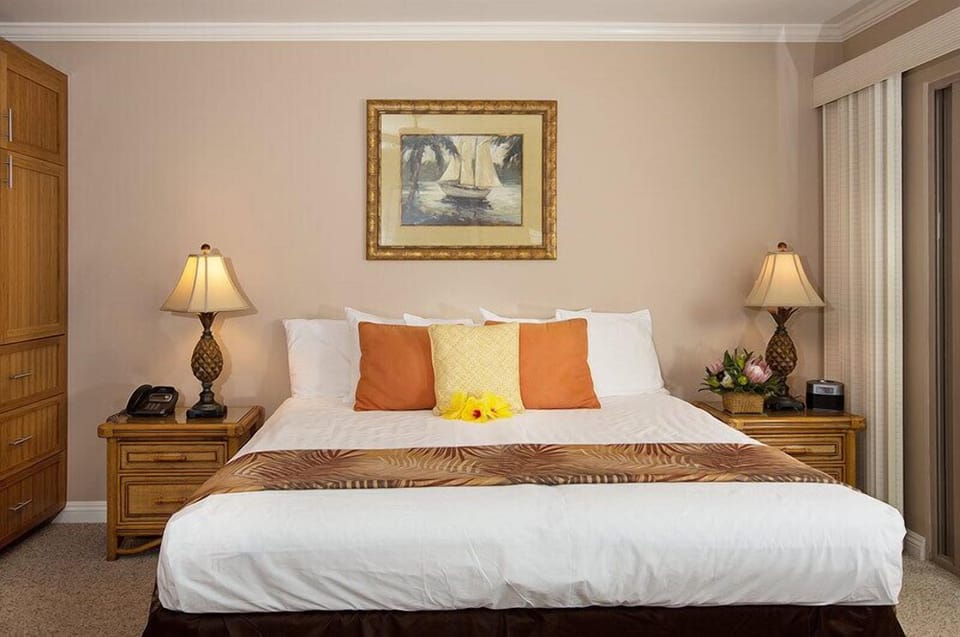 Deluxe Partial Ocean View Studio | Pillowtop beds, in-room safe, individually decorated