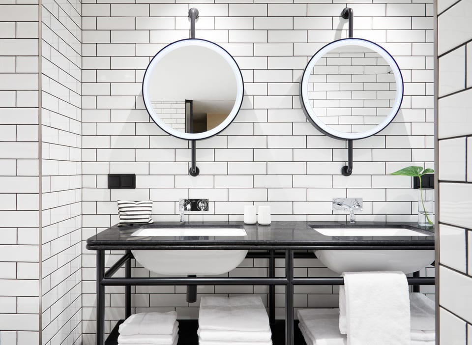 Shower, rainfall showerhead, hair dryer, towels