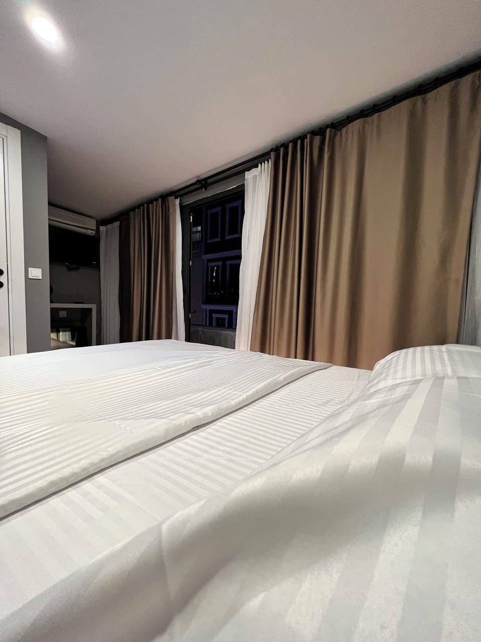 Frette Italian sheets, premium bedding, down comforters