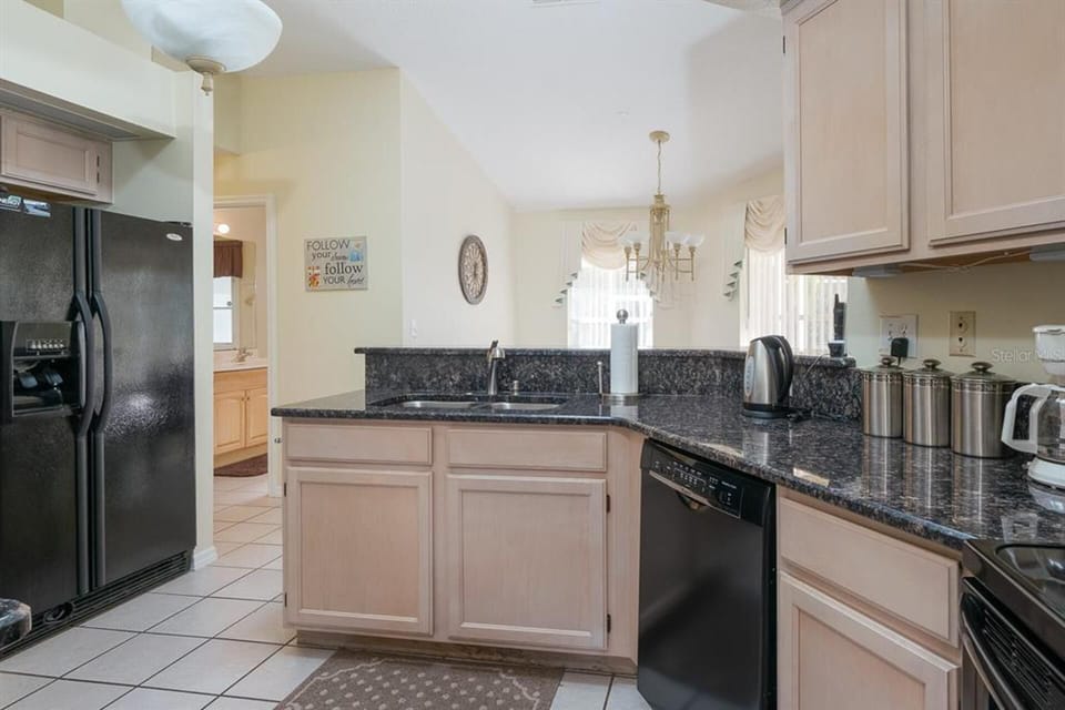 Villa | Private kitchen | Fridge, microwave, oven, stovetop