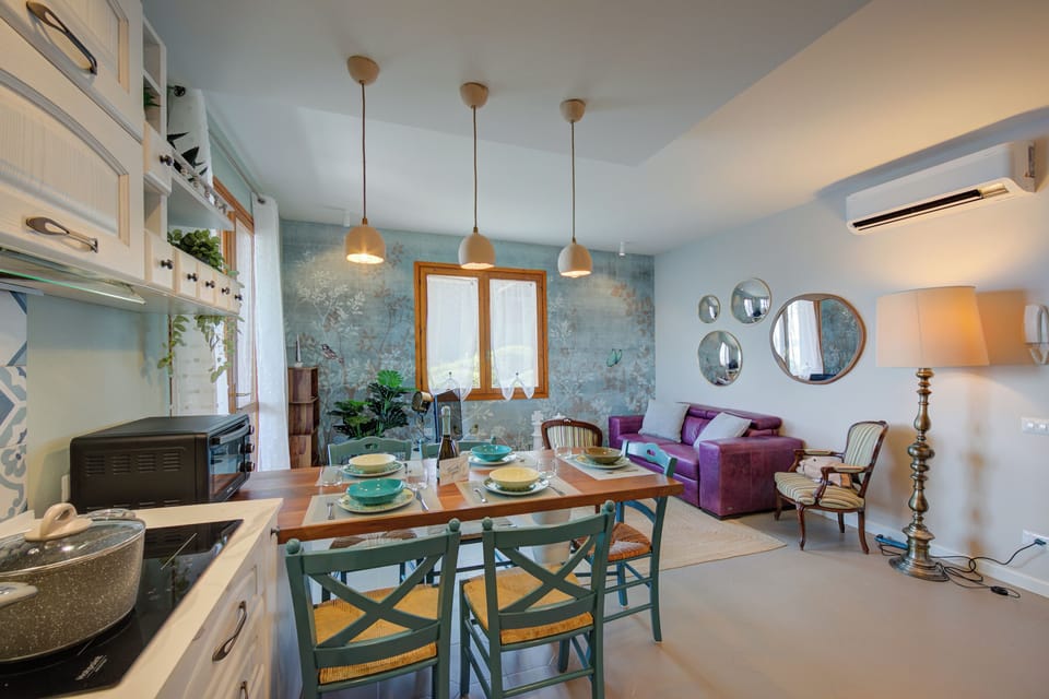 Family Apartment, Multiple Bedrooms, Mountainside (Pandora Lake View Stresa) | Private kitchen | Fridge, microwave, oven, stovetop