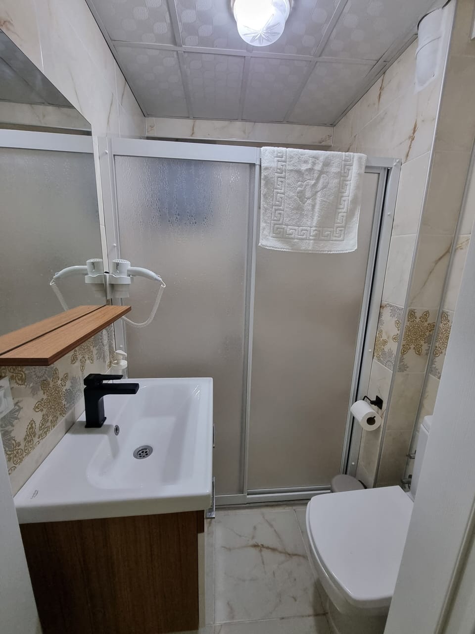 Design Apartment, 1 King Bed with Sofa bed, Courtyard View, Garden Area | Bathroom | Shower, hair dryer, slippers, towels