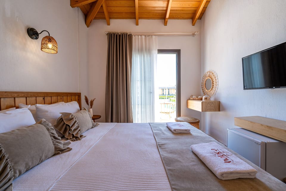 Standard Triple Room, Non Smoking, Balcony | Garden view