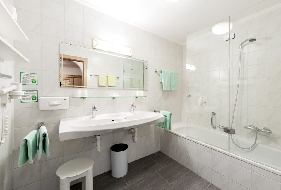 Family Quadruple Room, Mountainside | Deep soaking bathtub