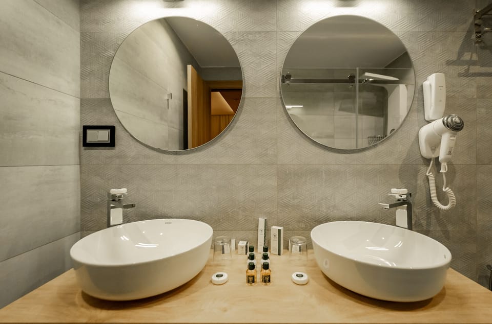 Shower, free toiletries, hair dryer, bathrobes