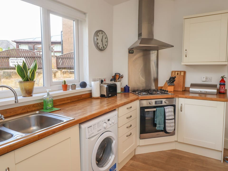 Fridge, electric kettle, toaster, cookware/dishes/utensils