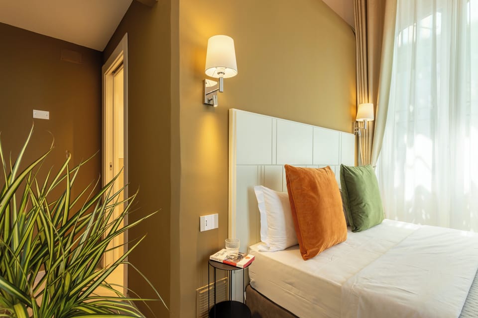 Exclusive Double Room, 1 Queen Bed, Terrace, Harbor View | Hypo-allergenic bedding available, minibar (free items), desk