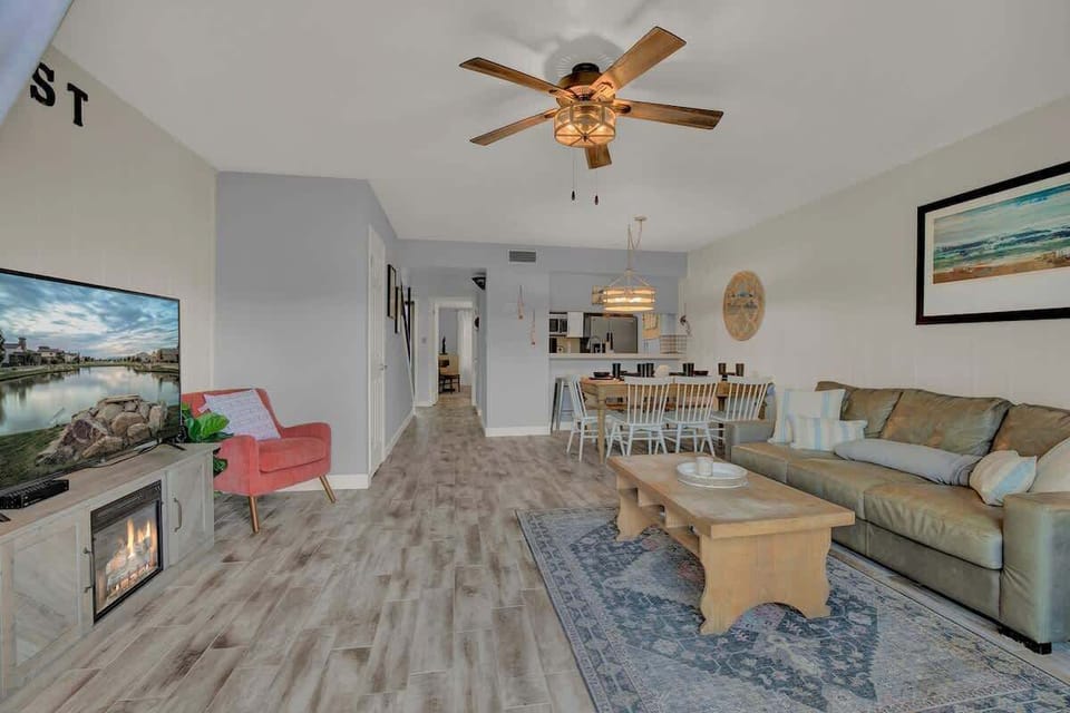 Condo, Multiple Beds, Pool Access (2107 Bayhouse Dr) | Living area | Fireplace