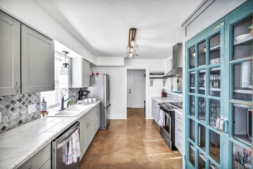 House, Multiple Beds, Patio (1305 Lakeshore Dr) | Private kitchen | Coffee/tea maker, electric kettle