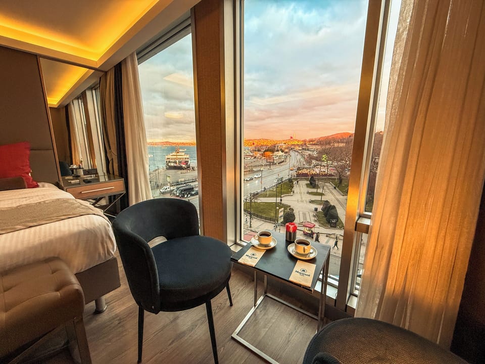 Junior Suite, Partial Sea View | Living area | Flat-screen TV