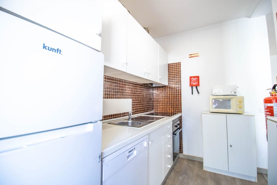 Apartment, 1 Bedroom, Pool Access | Private kitchen | Microwave, oven, dishwasher, coffee/tea maker