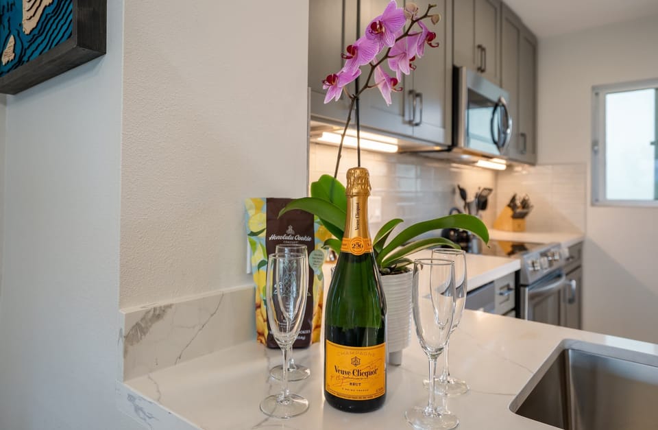 Luxury Condo | Private kitchen | Full-size fridge, microwave, oven, stovetop
