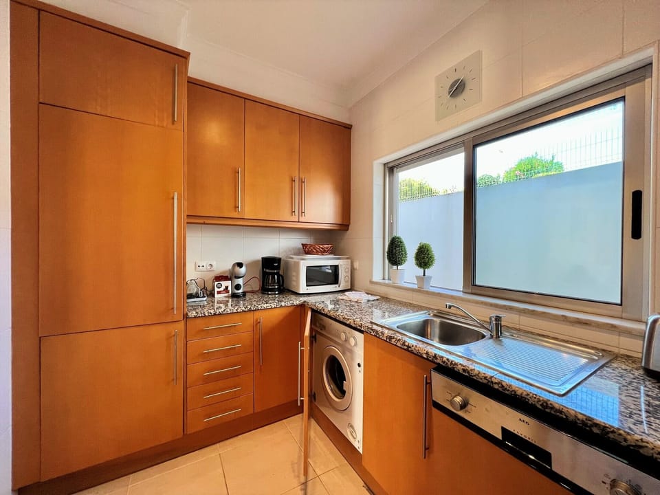 Apartment, 1 Bedroom, Pool Access | Private kitchen | Coffee/tea maker, microwave, oven, dishwasher