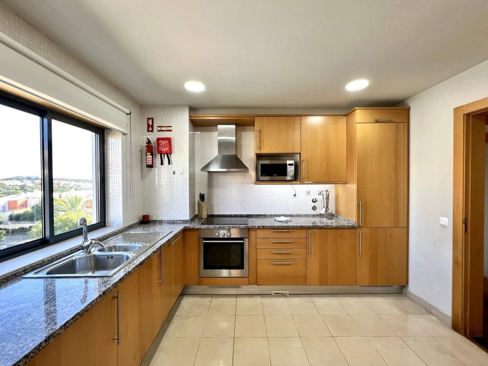 Apartment, 2 Bedrooms, Pool Access | Private kitchen | Microwave, oven, dishwasher, coffee/tea maker