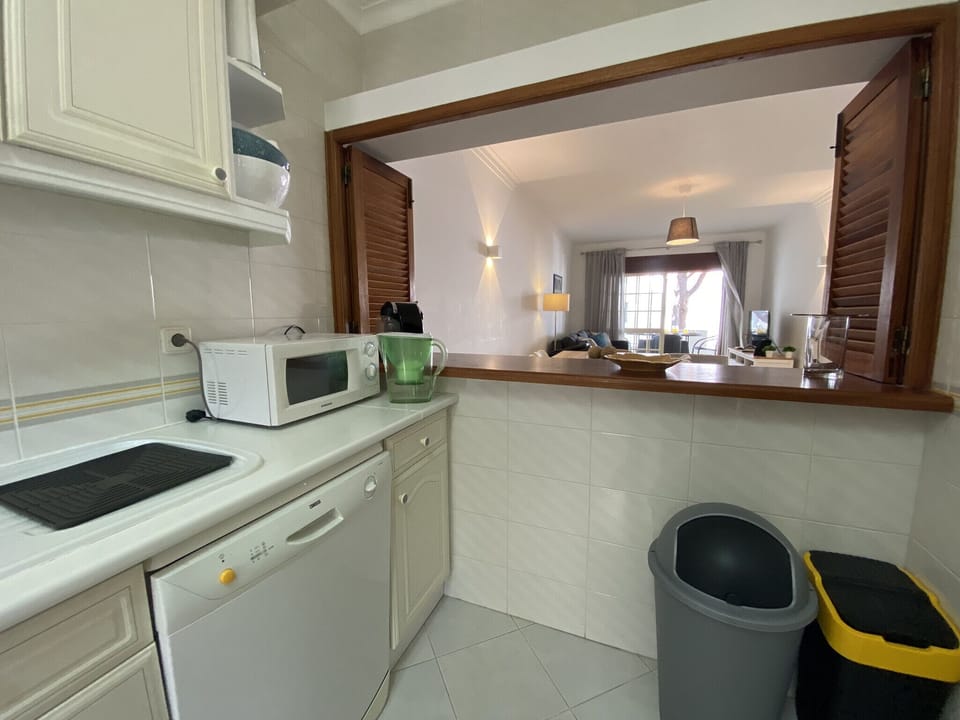 Apartment, 2 Bedrooms, Pool Access | Private kitchen | Coffee/tea maker, microwave, oven, dishwasher