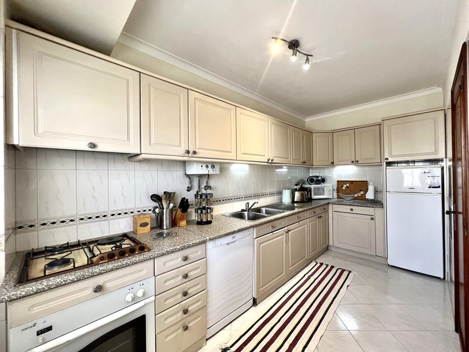 Apartment, 2 Bedrooms, Pool Access | Private kitchen | Coffee/tea maker, microwave, oven, dishwasher