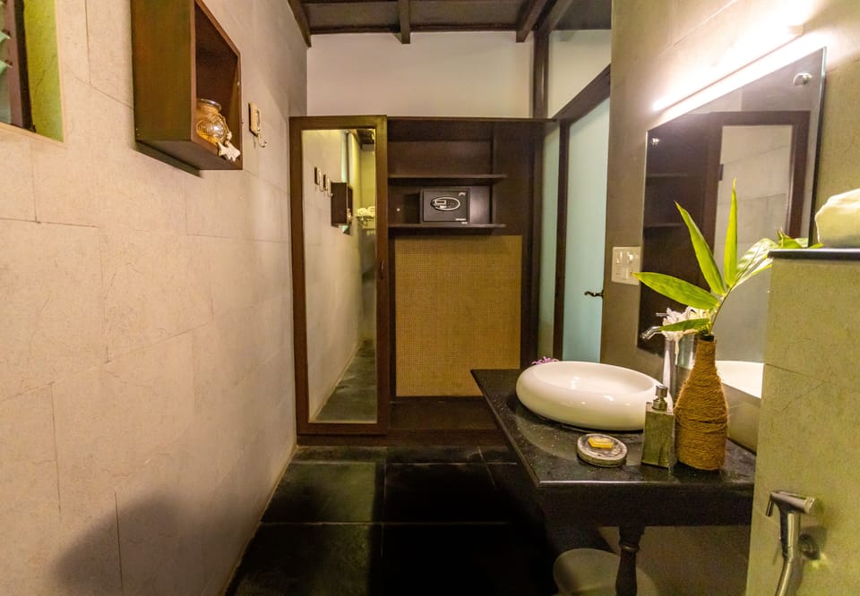Premium Villa | Bathroom | Rainfall showerhead, slippers, towels