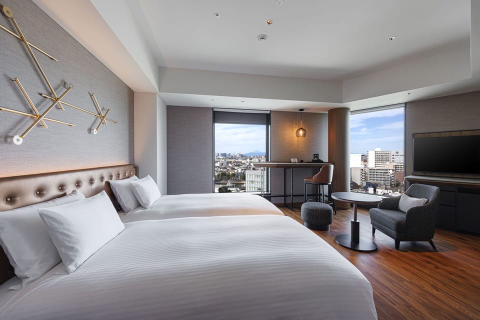Premium bedding, down comforters, pillowtop beds, in-room safe