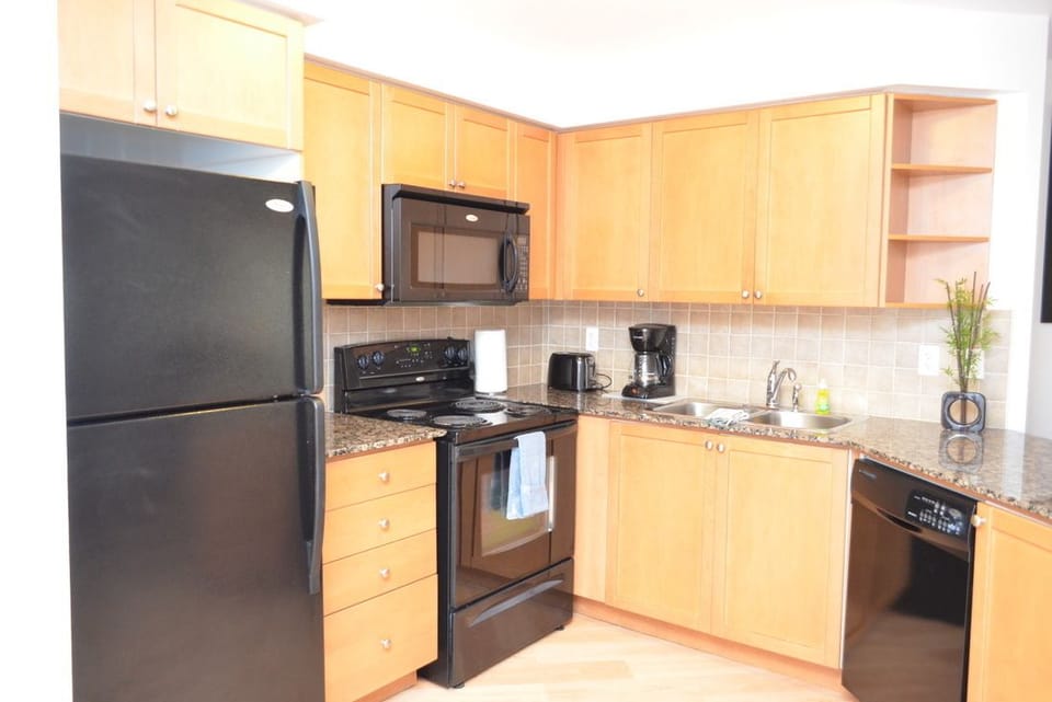 Executive Suite, 2 Bedrooms | Private kitchen | Full-size fridge, microwave, oven, stovetop