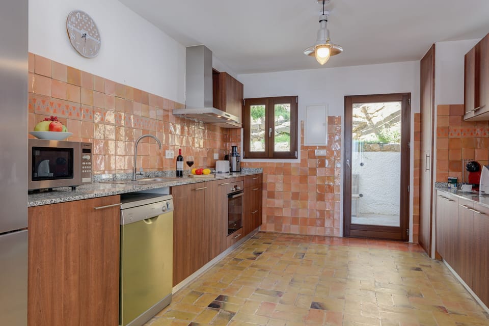 Villa | Private kitchen | Fridge, microwave, oven, stovetop