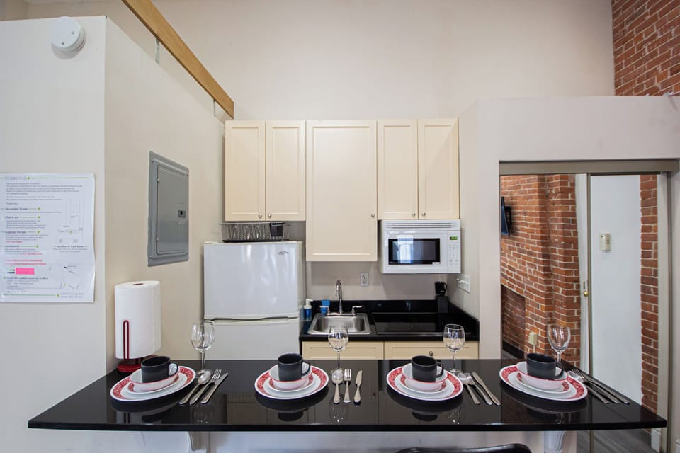 Charming Studio #15 | Private kitchen | Full-size fridge, microwave, stovetop, electric kettle