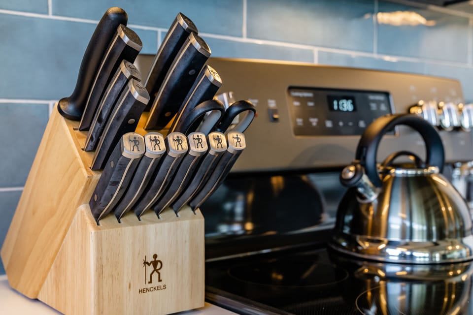 Luxury Condo | Private kitchen | Full-size fridge, microwave, oven, stovetop
