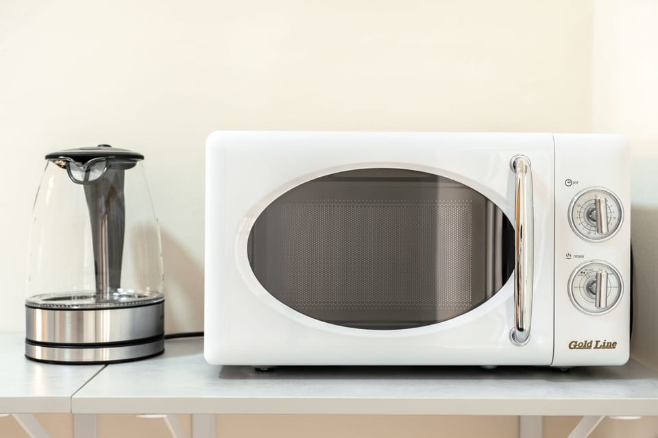 Comfort Apartment | Microwave