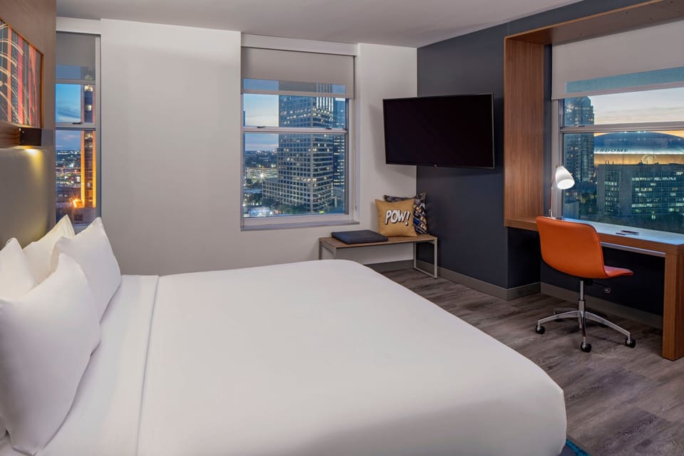 Hypo-allergenic bedding, down comforters, in-room safe, desk