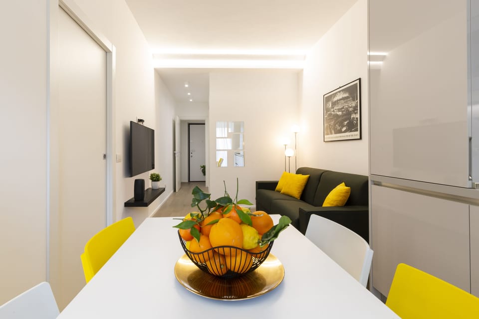 City Apartment | Living area | 49-inch flat-screen TV with digital channels, TV