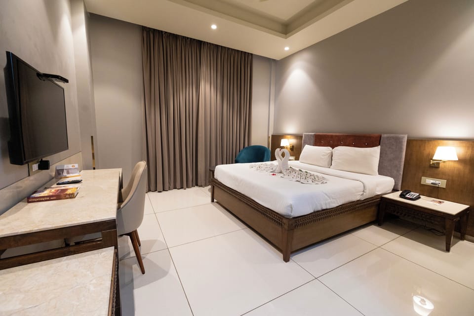 Deluxe Double Room | In-room safe, blackout drapes, iron/ironing board, free WiFi