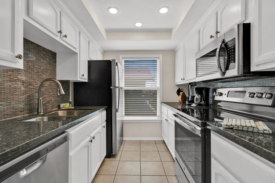 Condo, 2 Bedrooms | Private kitchen | Coffee/tea maker, fridge, oven, toaster