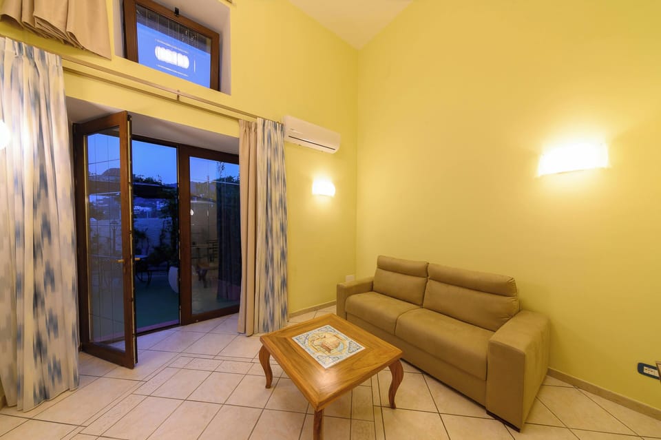Superior Studio Suite, Terrace | Living area | Flat-screen TV