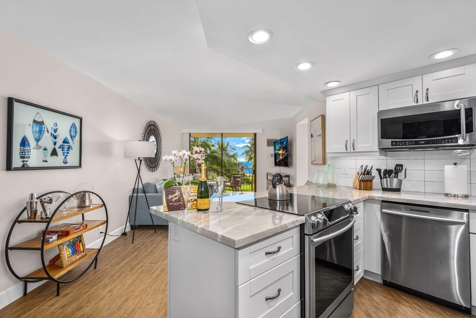 Luxury Condo | Private kitchen | Full-size fridge, microwave, oven, stovetop