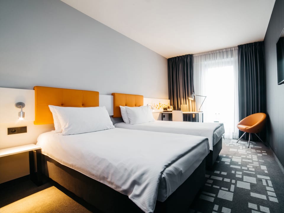 Twin Room, 2 Twin Beds | In-room safe, desk, soundproofing, iron/ironing board