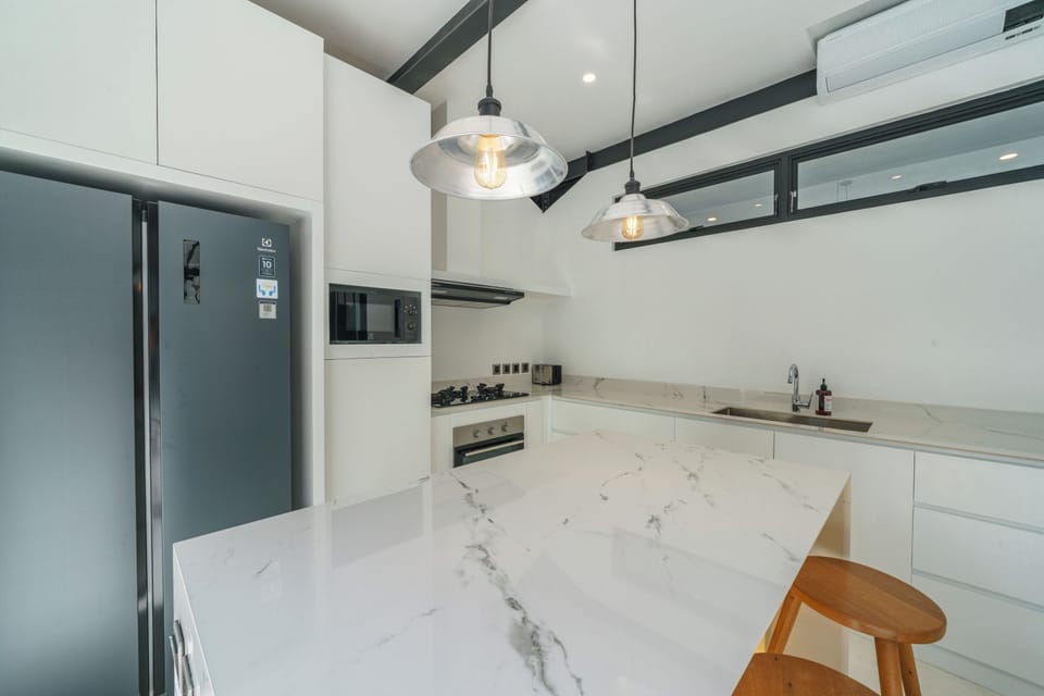 Luxury Villa | Private kitchen | Fridge, microwave, stovetop, toaster
