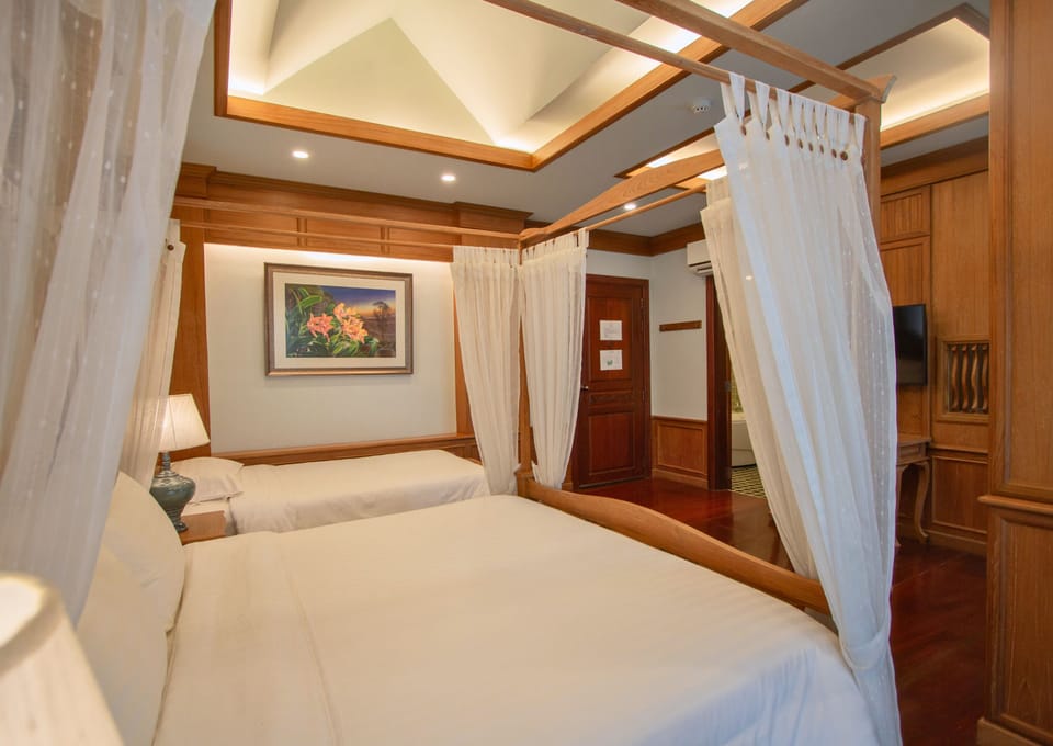 Deluxe Triple Room | Premium bedding, minibar, in-room safe, individually decorated