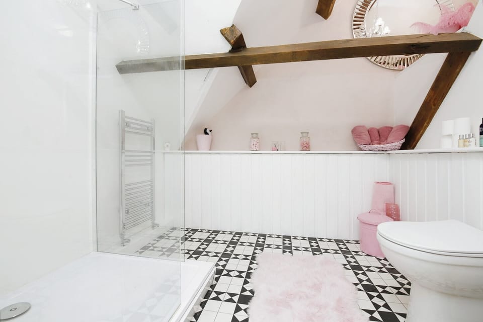 Designer toiletries, hair dryer, towels, soap