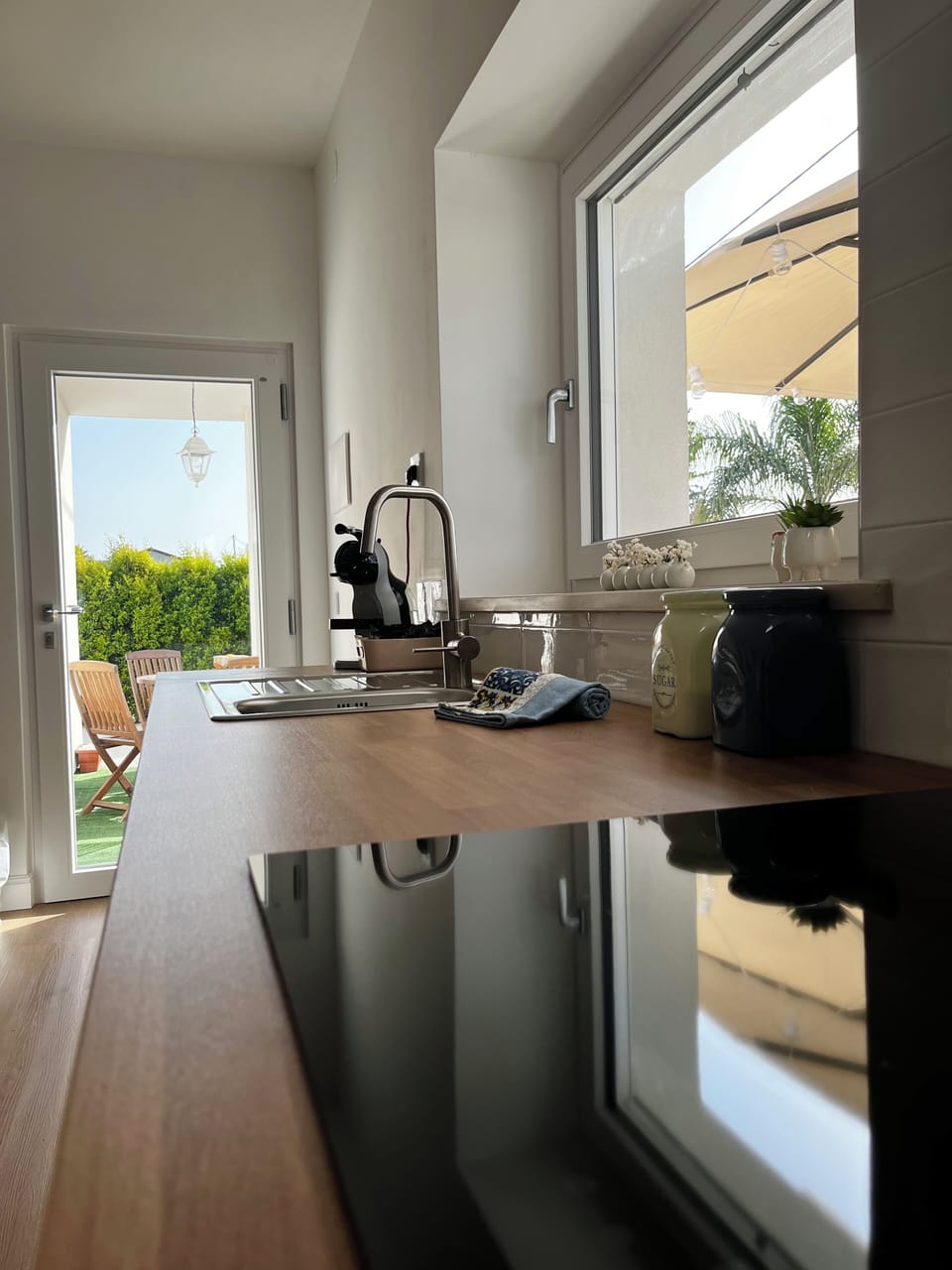 Comfort Villa | Private kitchen | Full-size fridge, stovetop, electric kettle, cookware/dishes/utensils