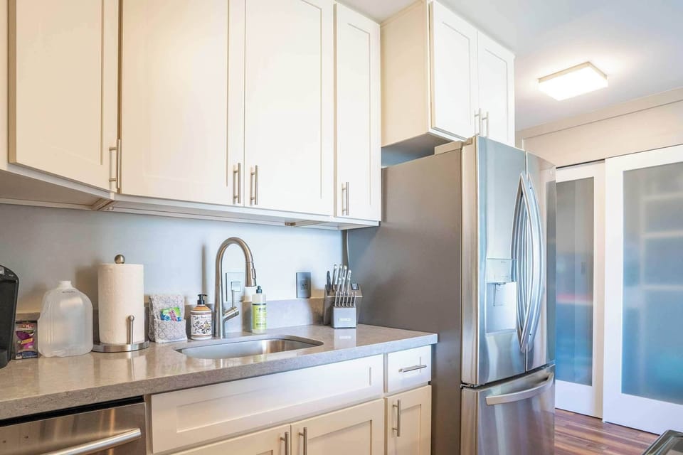 Luxury Condo | Private kitchen | Full-size fridge, microwave, oven, stovetop